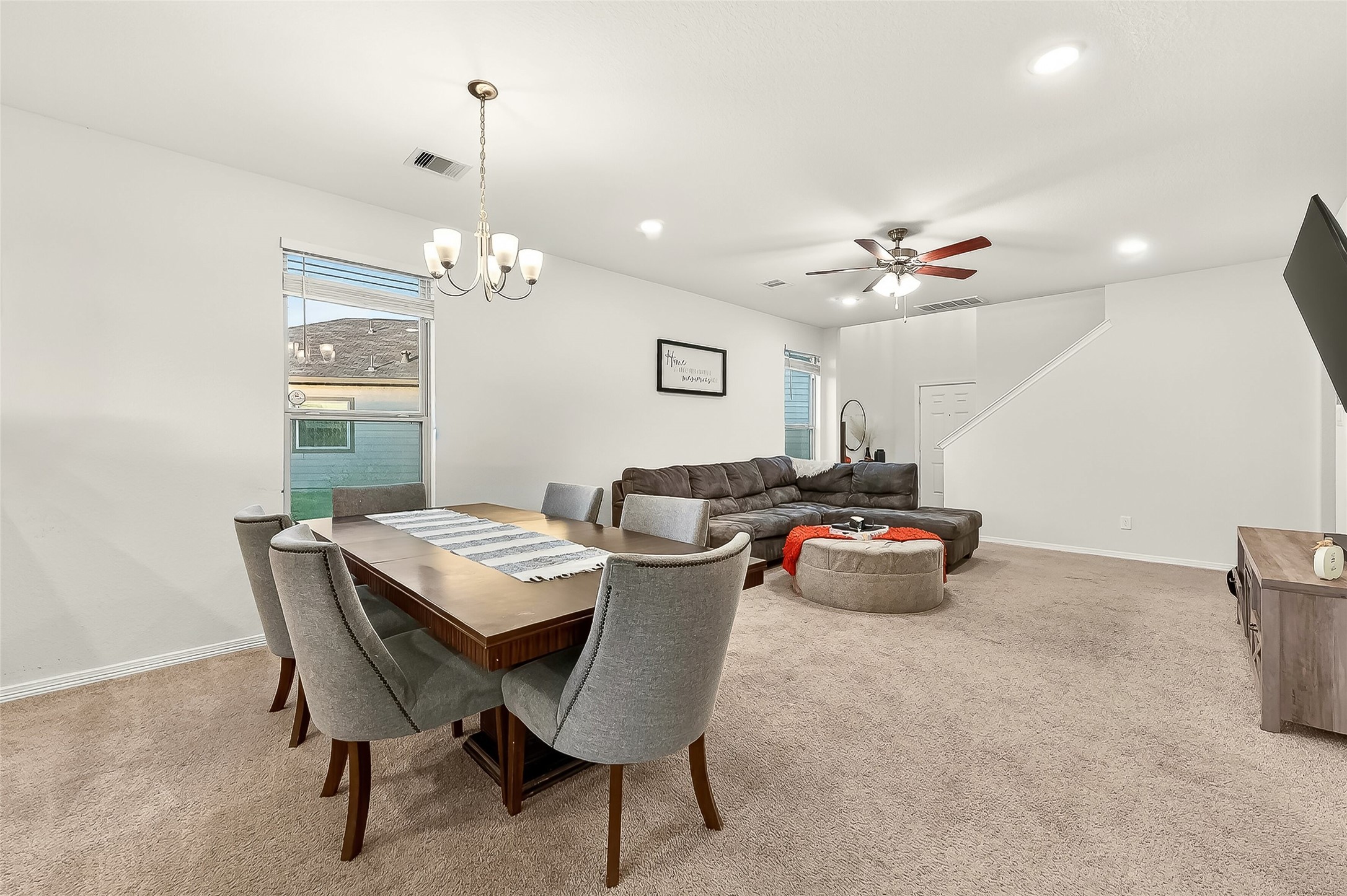 10023 Yanet Grove Lane Houston, TX 77044 - Photo 8 of 40 a view of a dining room with furniture