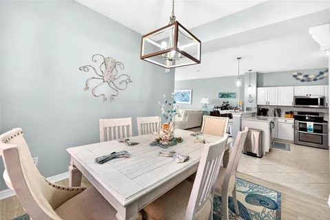 a view of a dining room with furniture