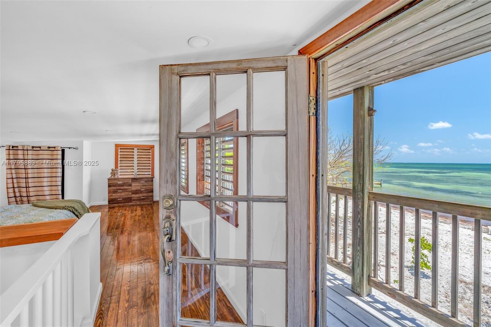 Lower Keys Big Pine Key, FL 33043 - Photo 14 of 43 a view of a living room and a large window