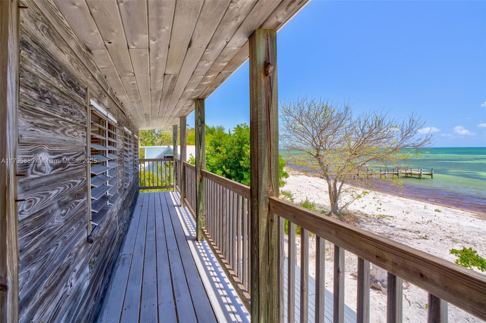 Lower Keys Big Pine Key, FL 33043 - Photo 18 of 43 a view of a balcony with wooden floor