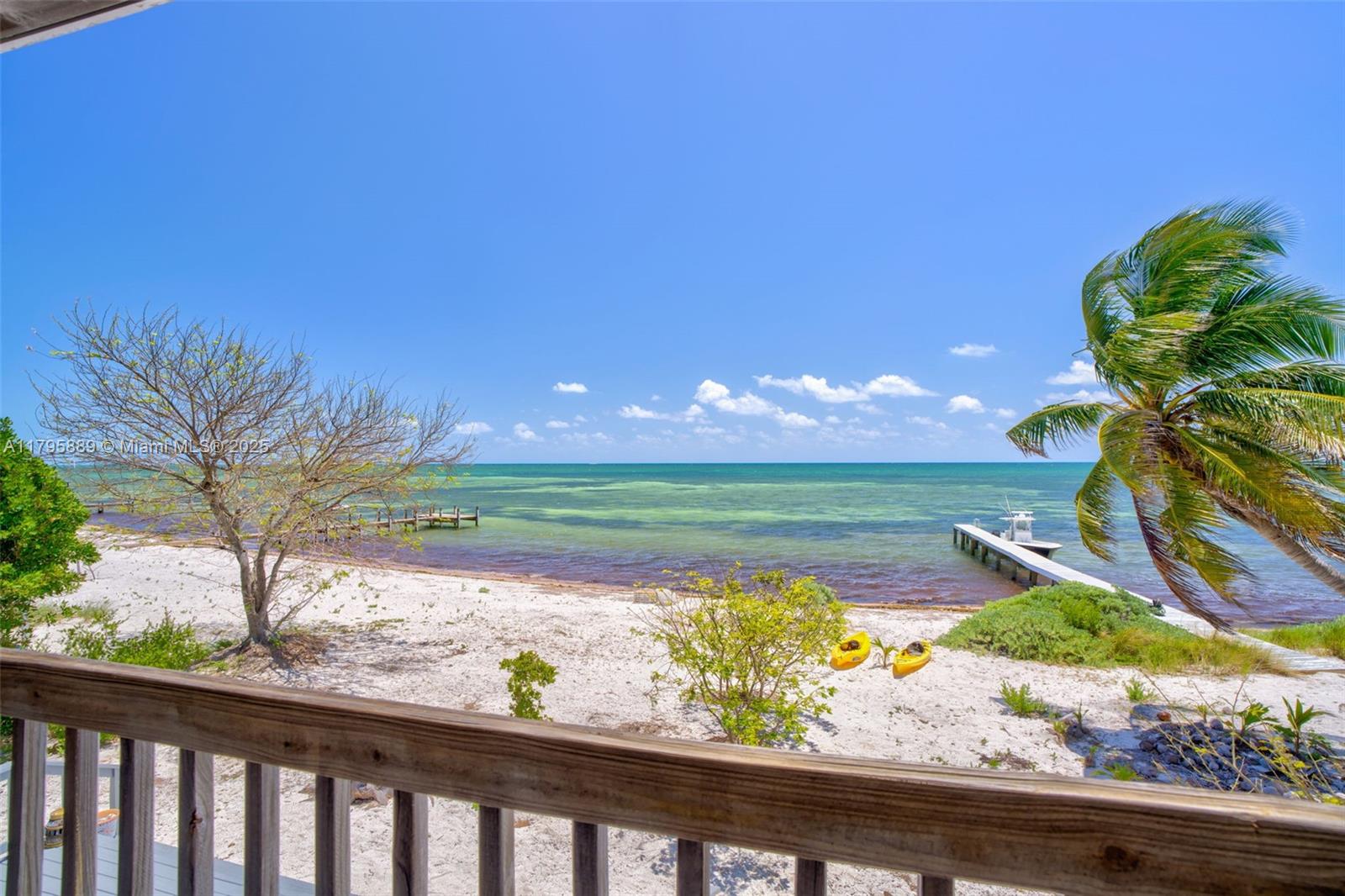 Lower Keys Big Pine Key, FL 33043 - Photo 19 of 43 a view of a lake from a balcony