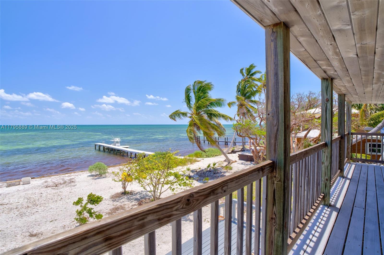 Lower Keys Big Pine Key, FL 33043 - Photo 20 of 43 a view of a balcony with wooden floor
