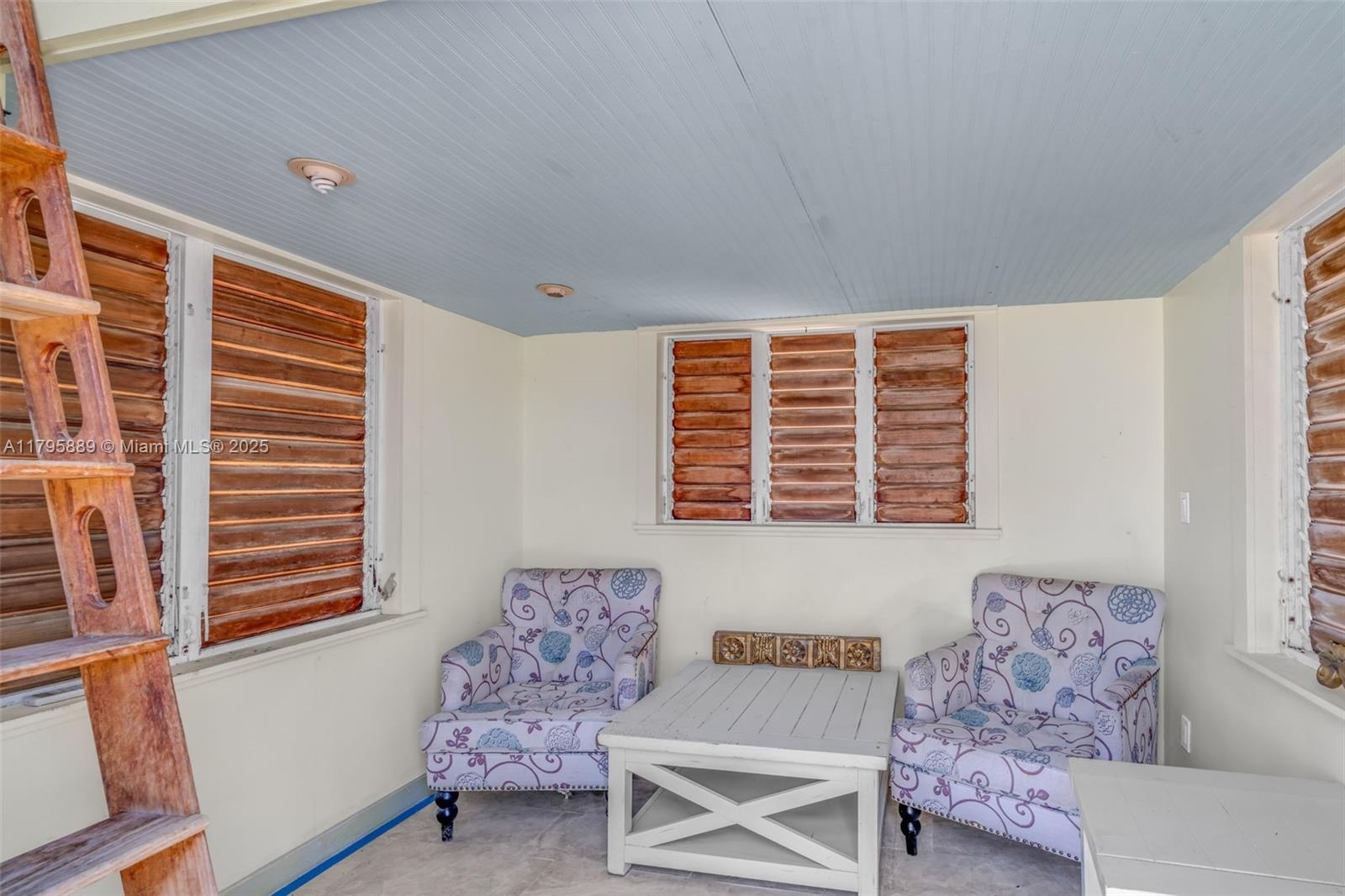 Lower Keys Big Pine Key, FL 33043 - Photo 24 of 43 a living room with furniture and a window