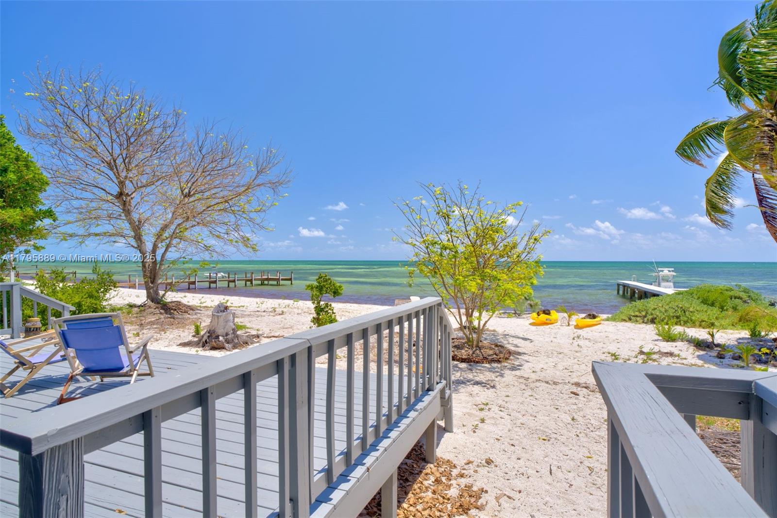 Lower Keys Big Pine Key, FL 33043 - Photo 26 of 43 a view of a porch with furniture and a garden