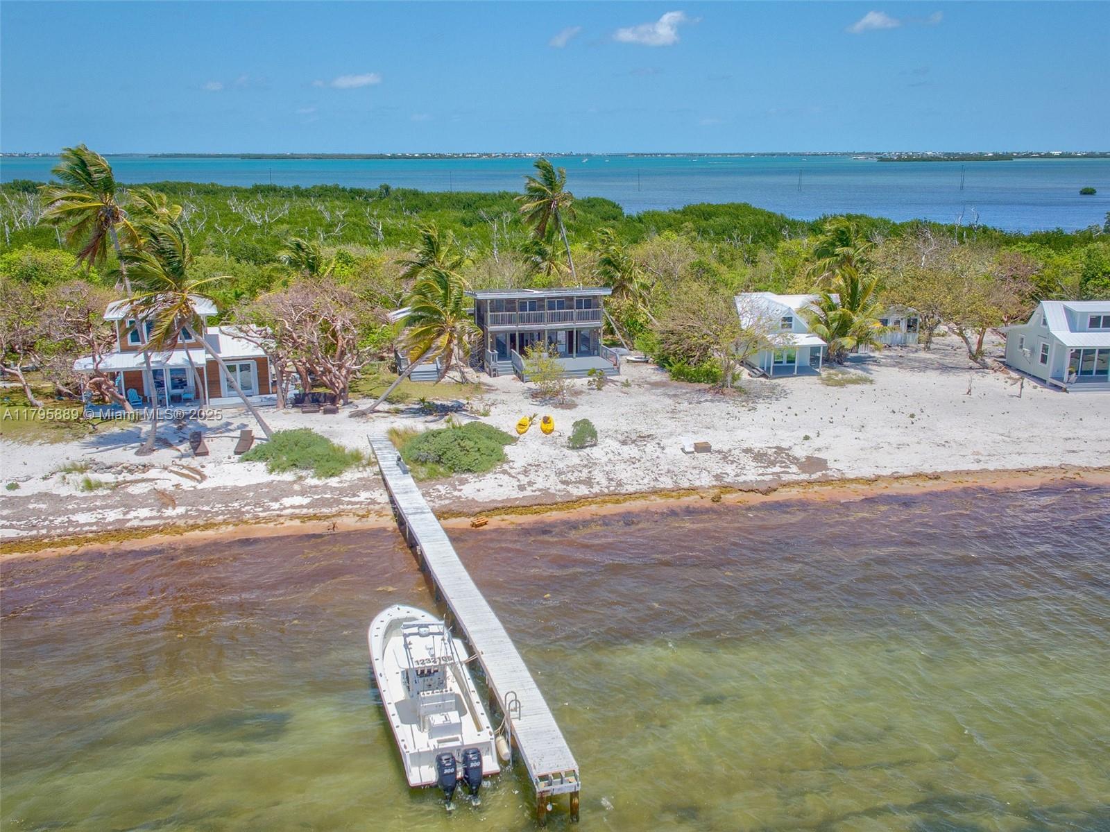 Lower Keys Big Pine Key, FL 33043 - Photo 29 of 43 a view of a yard with an outdoor space
