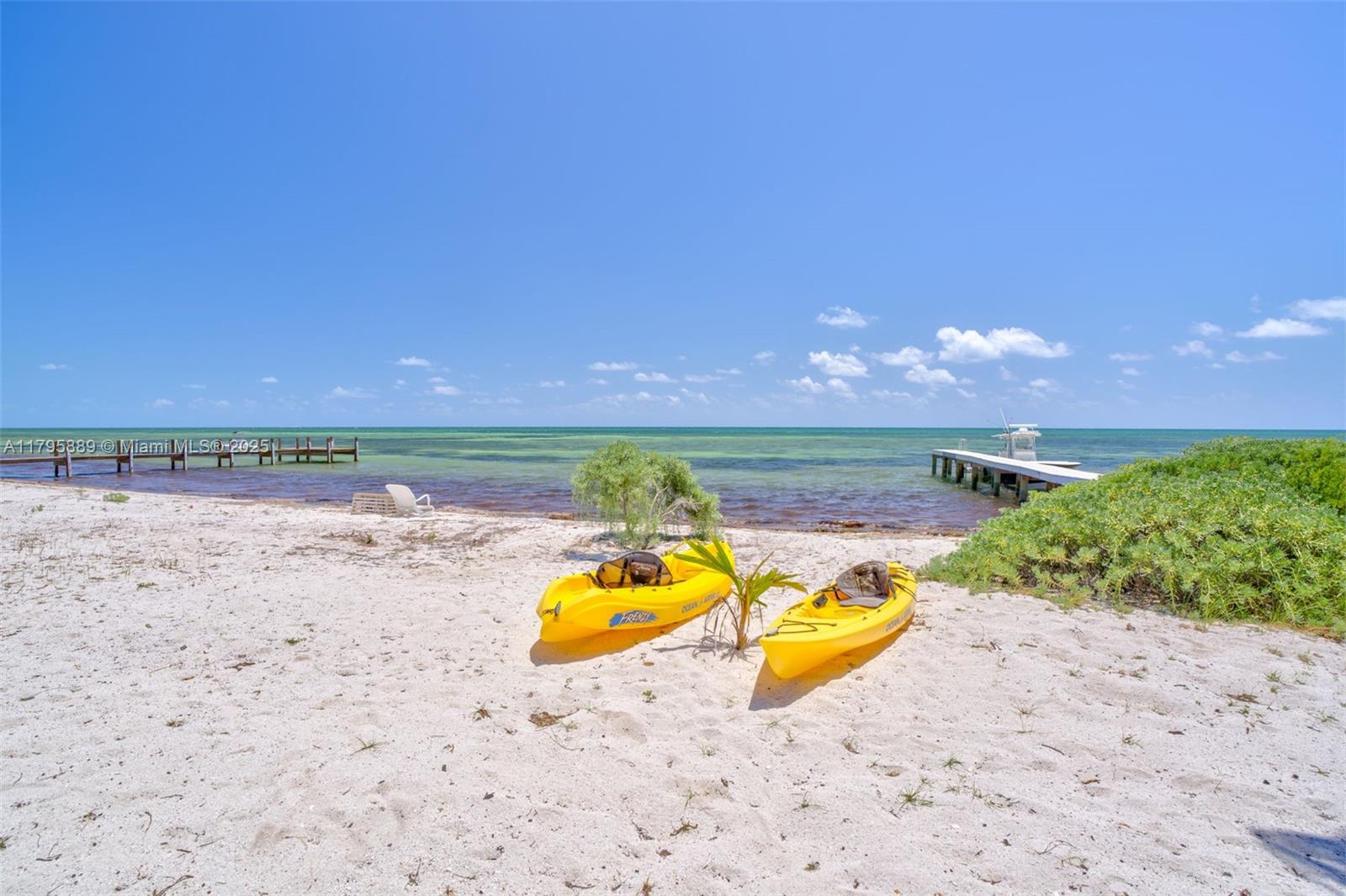 Lower Keys Big Pine Key, FL 33043 - Photo 3 of 43 a view of a lake with a beach