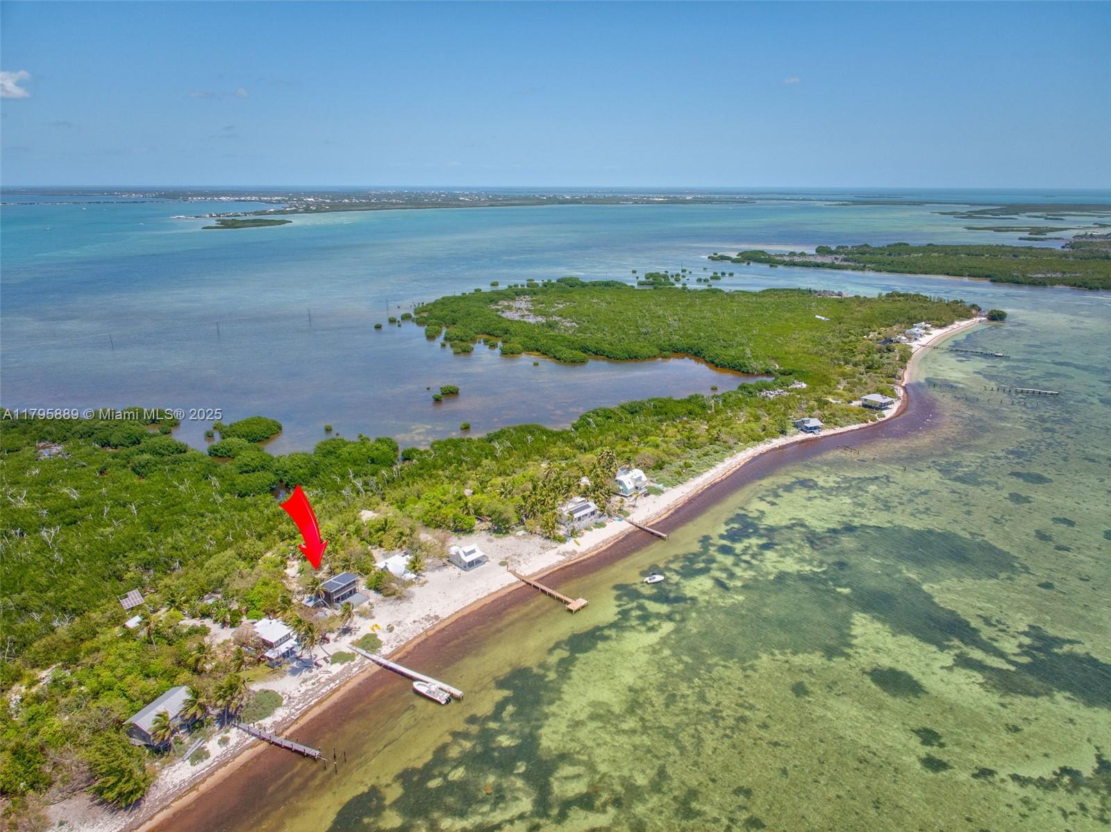 Lower Keys Big Pine Key, FL 33043 - Photo 36 of 43 a view of a lake with a outdoor space