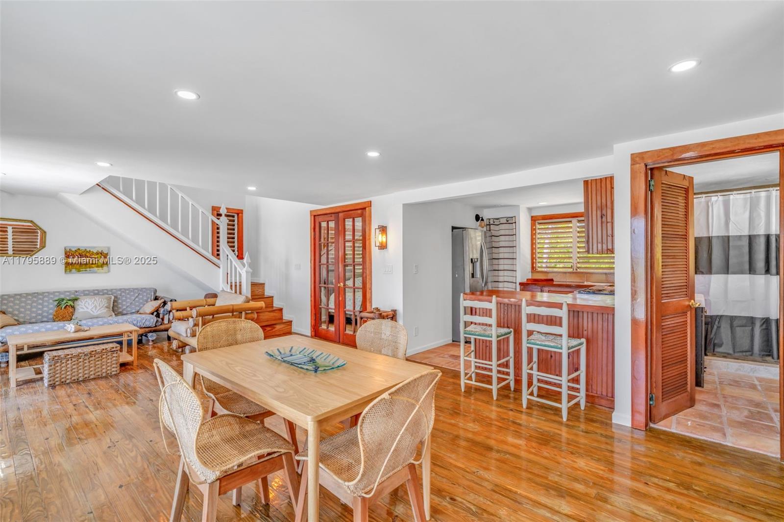 Lower Keys Big Pine Key, FL 33043 - Photo 6 of 43 a living room with furniture a wooden floor and next to a window