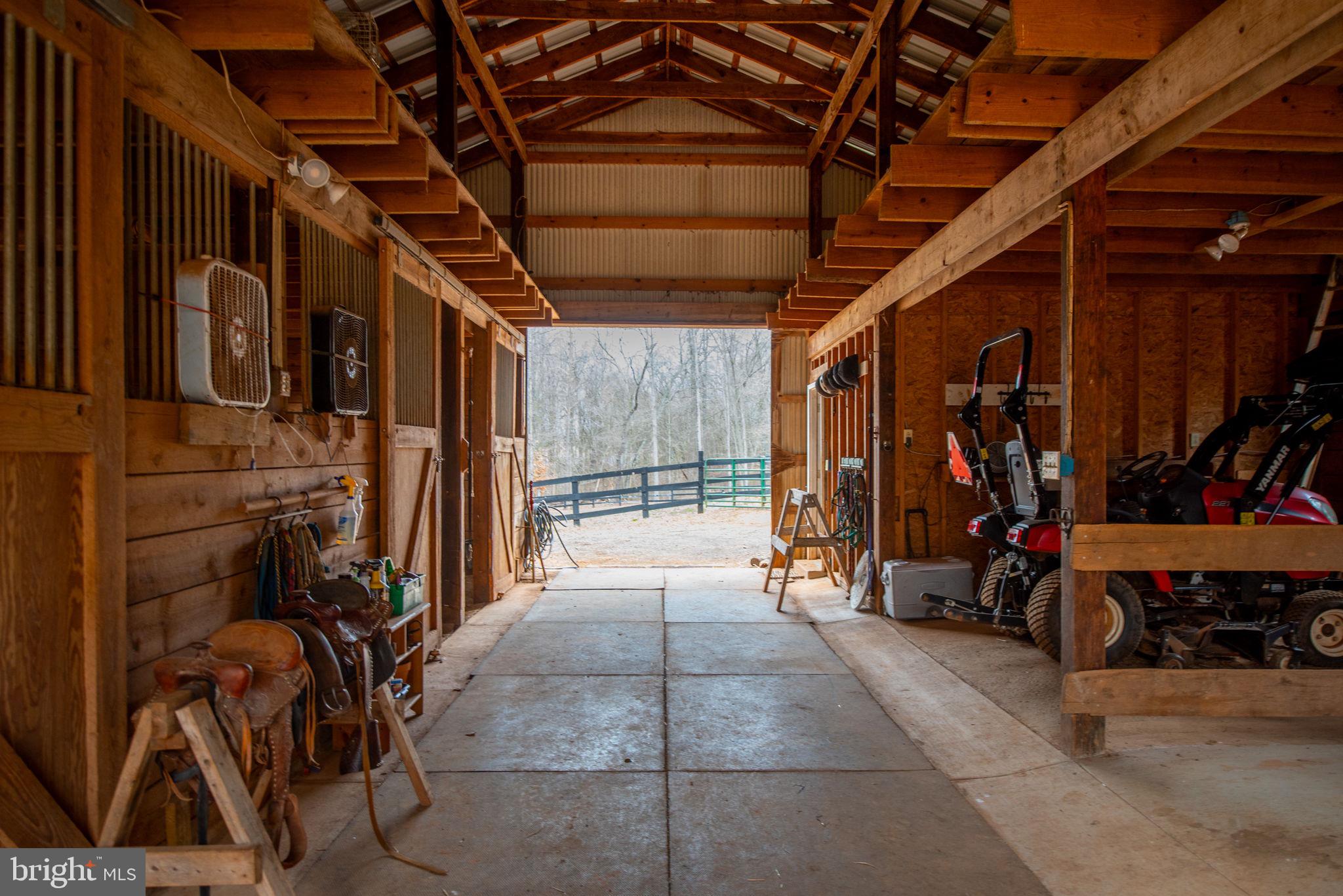 9435 Mt Zion Church Road Rixeyville, VA 22737 - Photo 54 of 97 Drive through 4-stall barn has electric & water