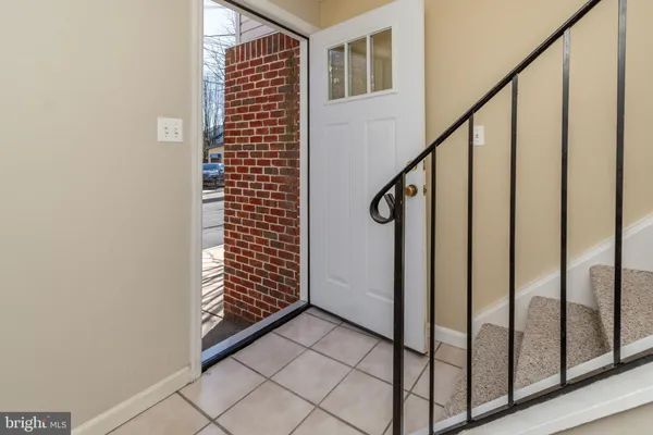 a view of an entryway with stairs