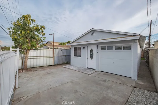 front view of a house with a garage
