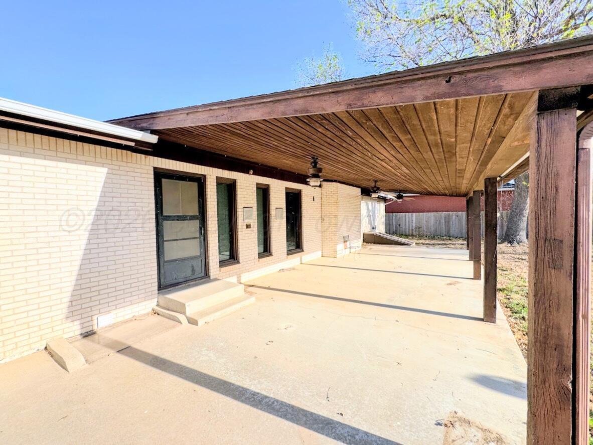 714 South Harvard Street Perryton, TX 79070 - Photo 23 of 27 a view of a house with a outdoor space