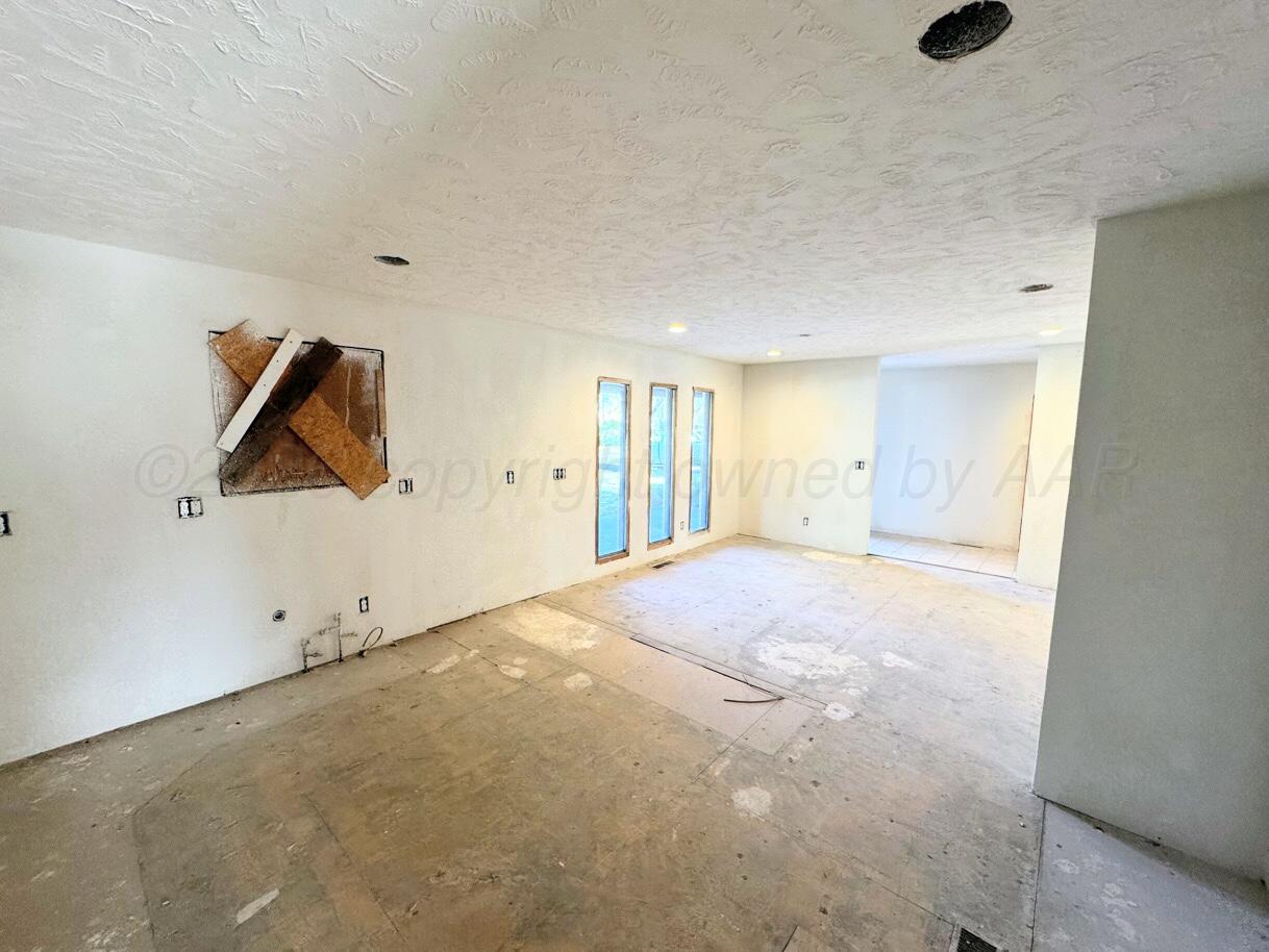 714 South Harvard Street Perryton, TX 79070 - Photo 3 of 27 a view of an empty room