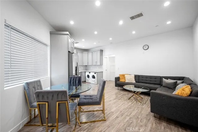 a living room with furniture and a table