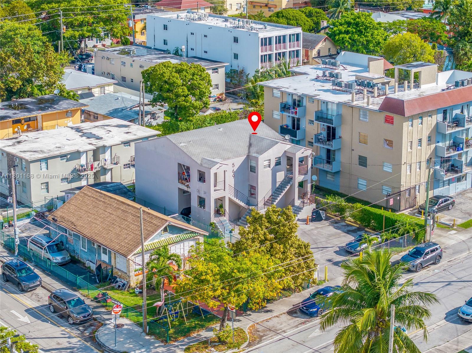 569 Southwest 4th Street Miami, FL 33130 - Photo 5 of 5 a aerial view of multiple houses with a yard