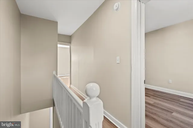 a view of hallway with washer and dryer