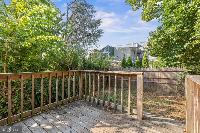 a view of a wooden fence