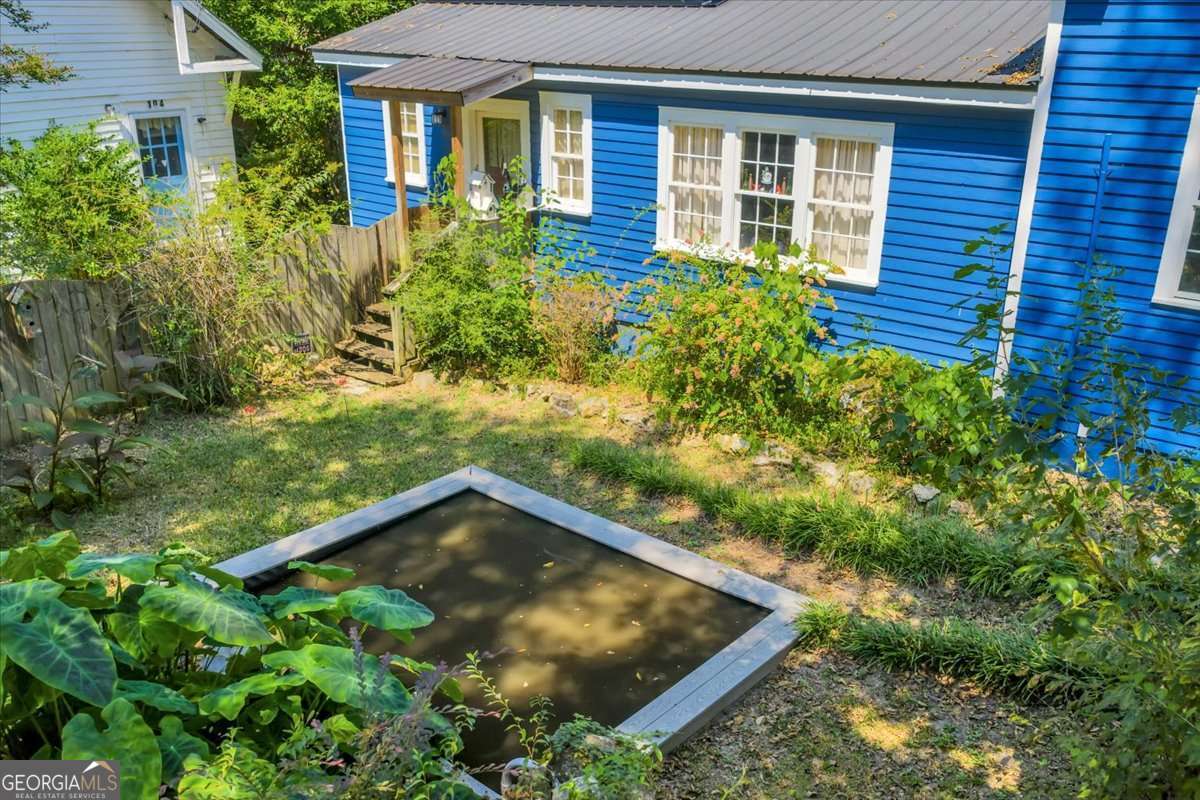 212 East Union Street Vienna, GA 31092 - Photo 52 of 62 a view of a backyard with plants