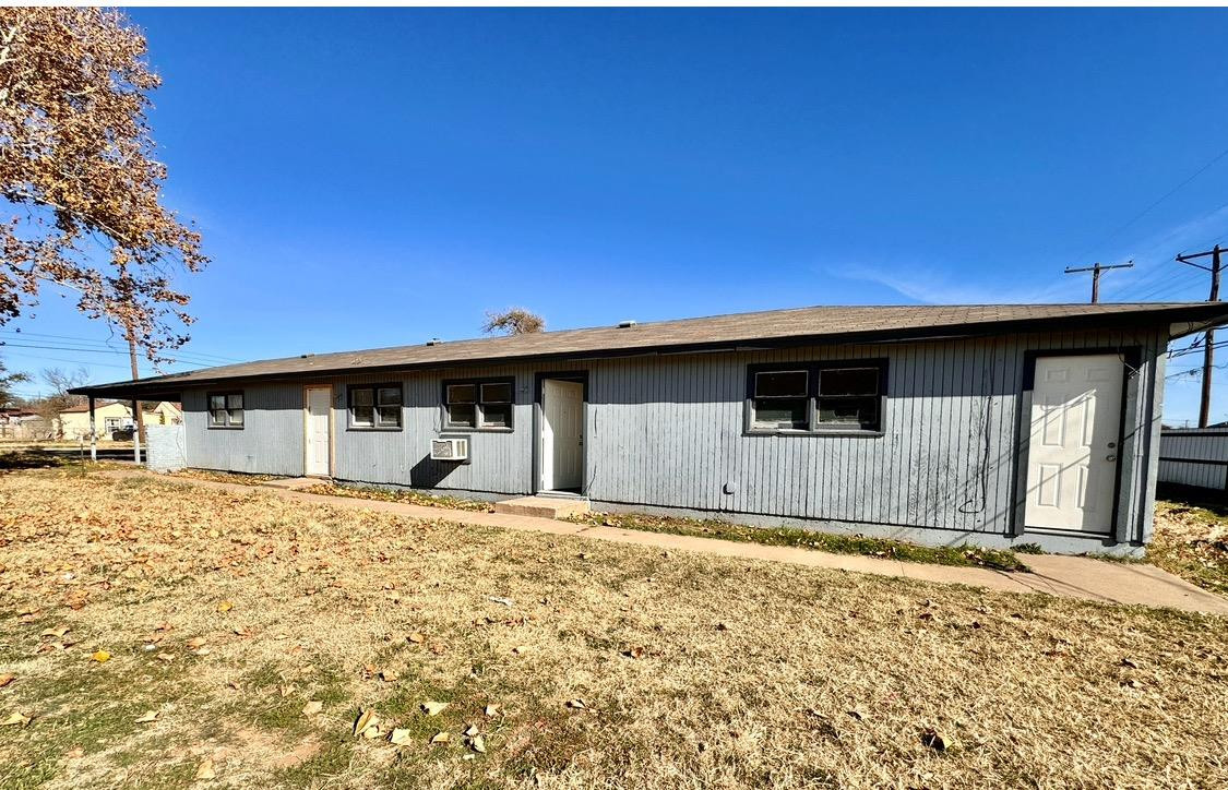 531 42nd Street Lubbock, TX 79404 - Photo 2 of 9 a front view of a house with a yard