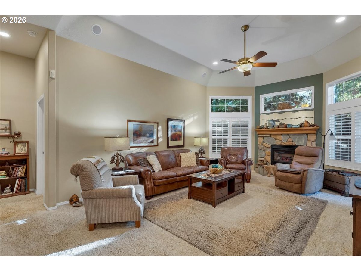 140 Gull Station Depoe Bay, OR 97341 - Photo 17 of 48 a living room with furniture a fireplace and a large window
