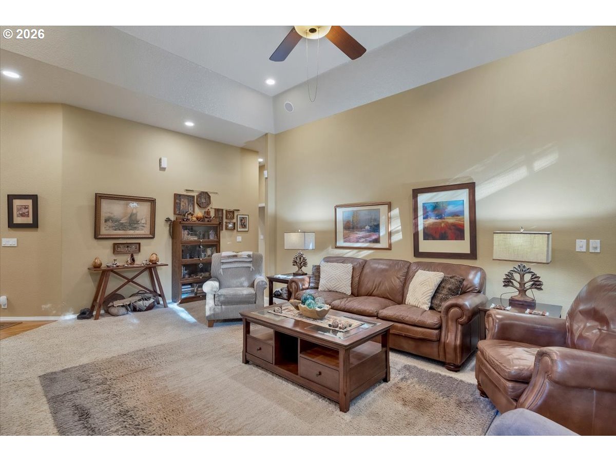 140 Gull Station Depoe Bay, OR 97341 - Photo 18 of 48 a living room with furniture a wooden floor and a gym