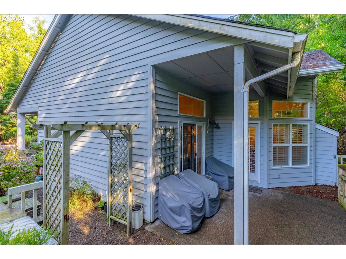 140 Gull Station Depoe Bay, OR 97341 - Photo 24 of 48 a view of a porch with a lounge chair