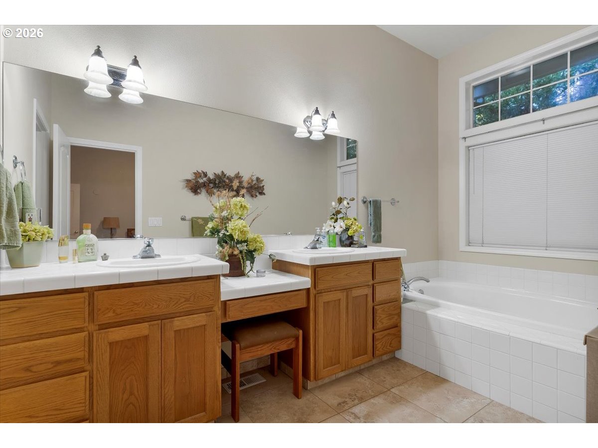 140 Gull Station Depoe Bay, OR 97341 - Photo 30 of 48 a bathroom with a sink double vanity and a mirror