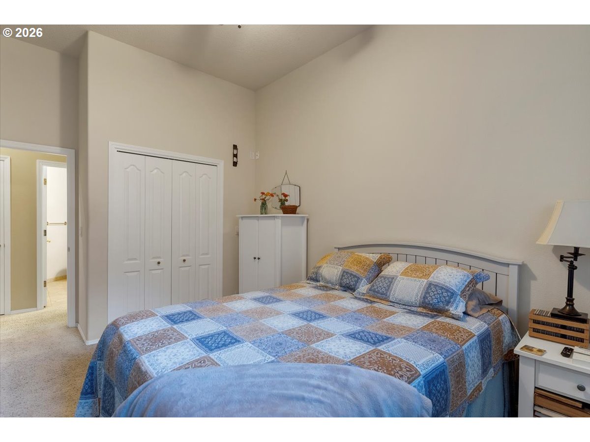 140 Gull Station Depoe Bay, OR 97341 - Photo 33 of 48 a bedroom with a bed and a television