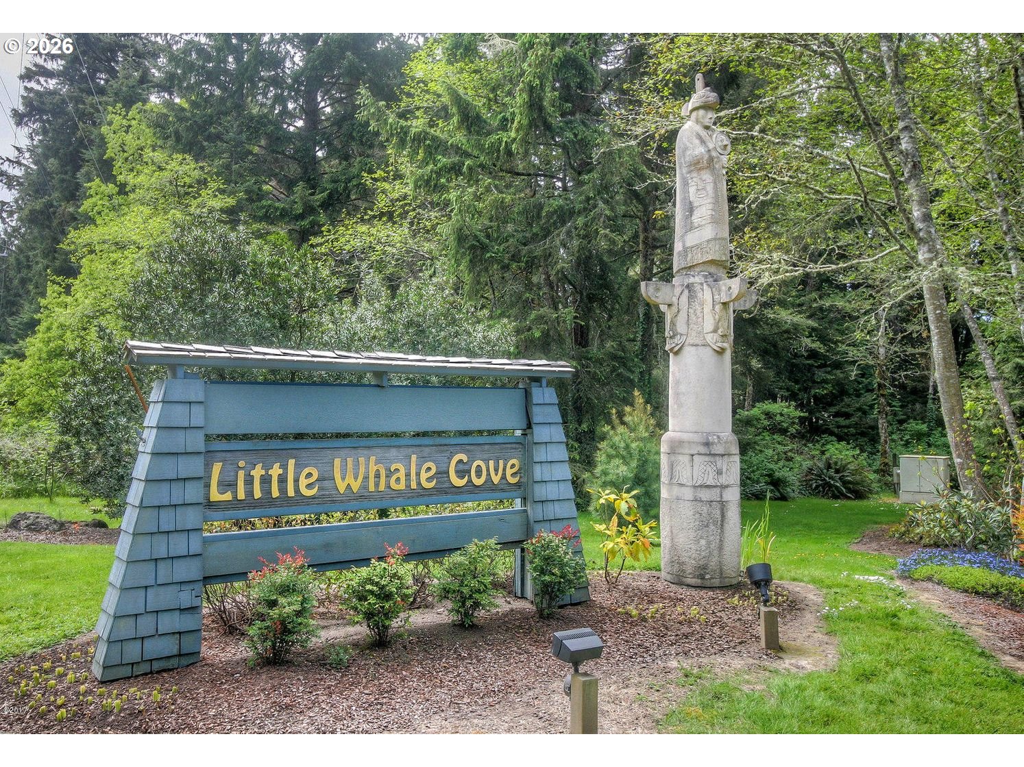 140 Gull Station Depoe Bay, OR 97341 - Photo 38 of 48 a sign board with a park bench