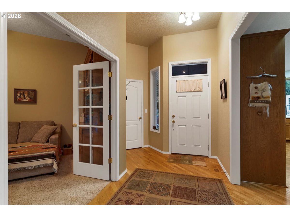 140 Gull Station Depoe Bay, OR 97341 - Photo 8 of 48 a bedroom with a bed and a couch