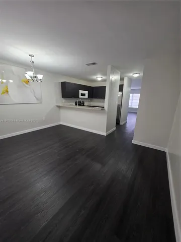 a view of a livingroom with furniture
