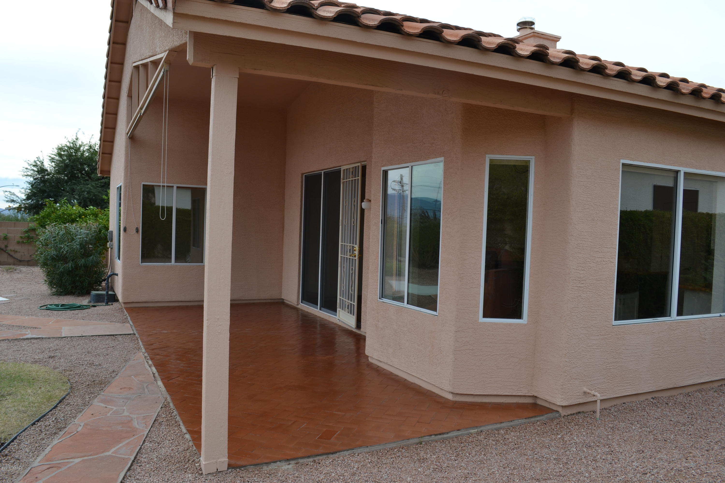 5640 North Cherokee Ridge Road Tucson, AZ 85750 - Photo 33 of 39 a view of a house with a balcony