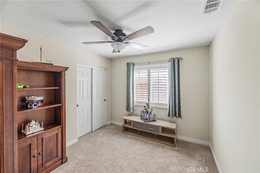 43121 Corte Cabrera Temecula, CA 92592 - Photo 7 of 17 a view of a room with shelves closet and window