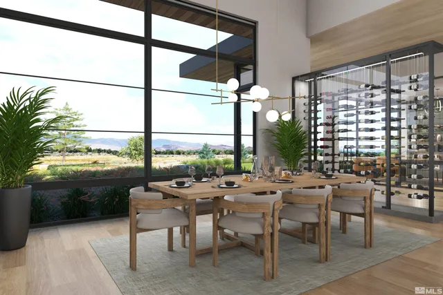 a room with lots of tables a large window and chairs