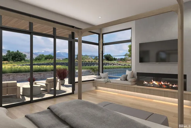 a very nice looking living room with a large window and a flat screen tv