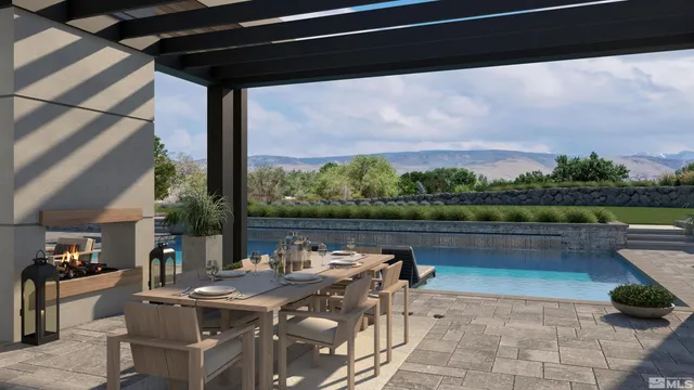 a view of swimming pool with outdoor seating and lake