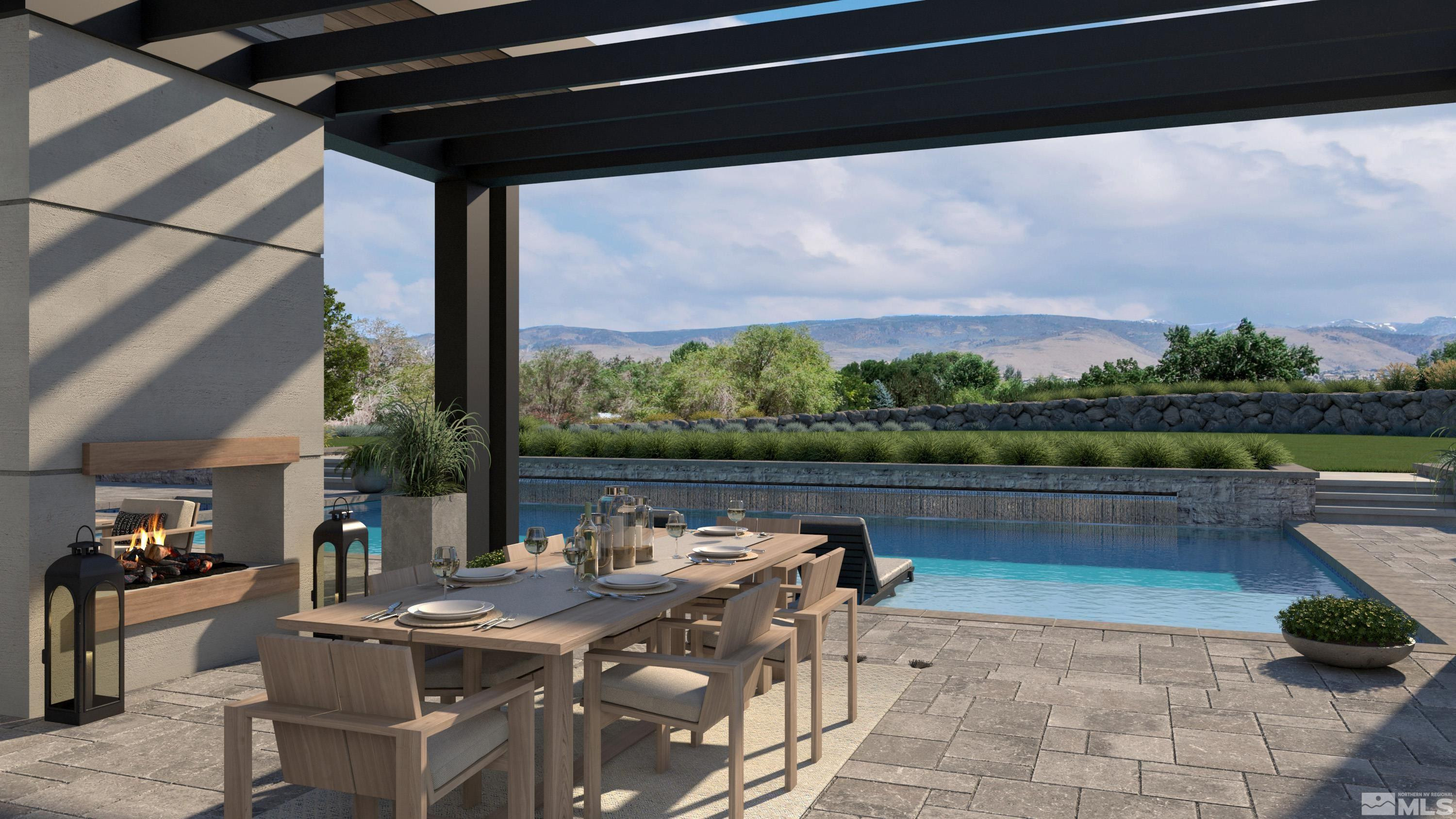 17 Glenhaven Drive Reno, NV 89511 - Photo 5 of 38 a view of swimming pool with outdoor seating and lake