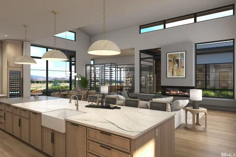 a large kitchen with a large window and stainless steel appliances