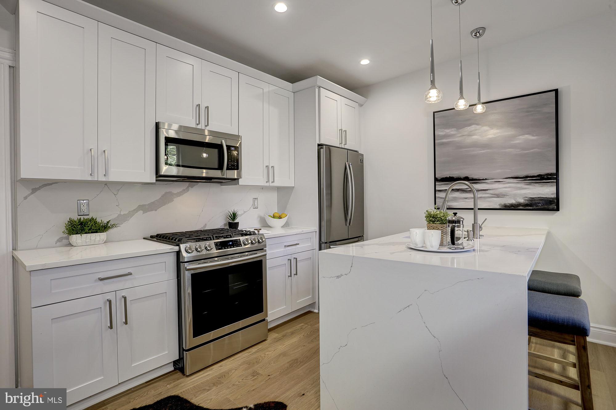 317 3rd Street Southeast, Unit 11 Washington, DC 20003 - Photo 4 of 19 Modern kitchen - photo of similar unit