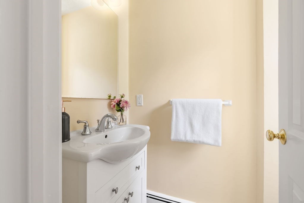 21 Vanderbelt Road Acton, MA 01720 - Photo 13 of 36 a bathroom with a sink and a mirror