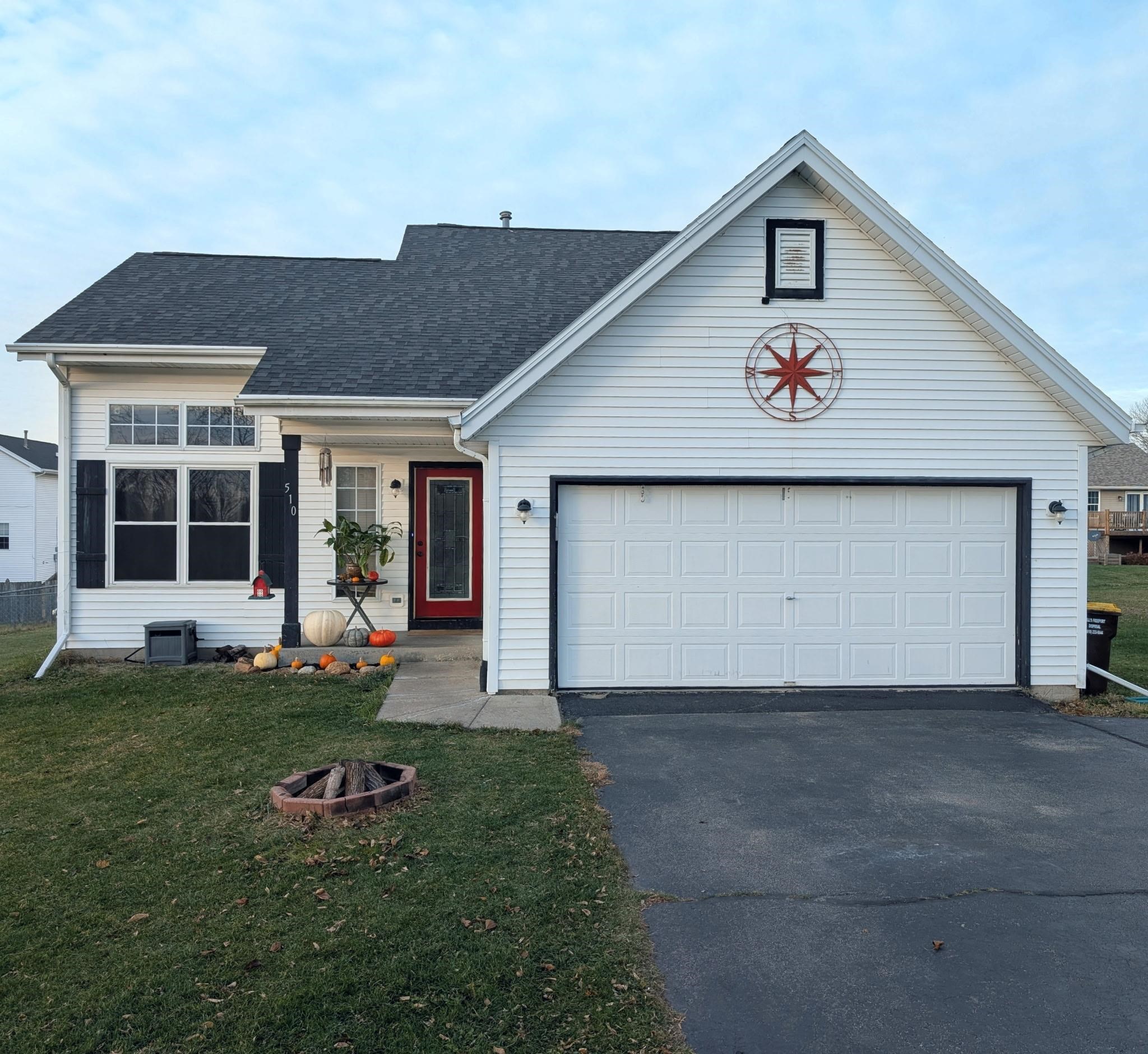 510 Berglund Road Pecatonica, IL 61063 - Photo 1 of 1 a front view of a house with a yard