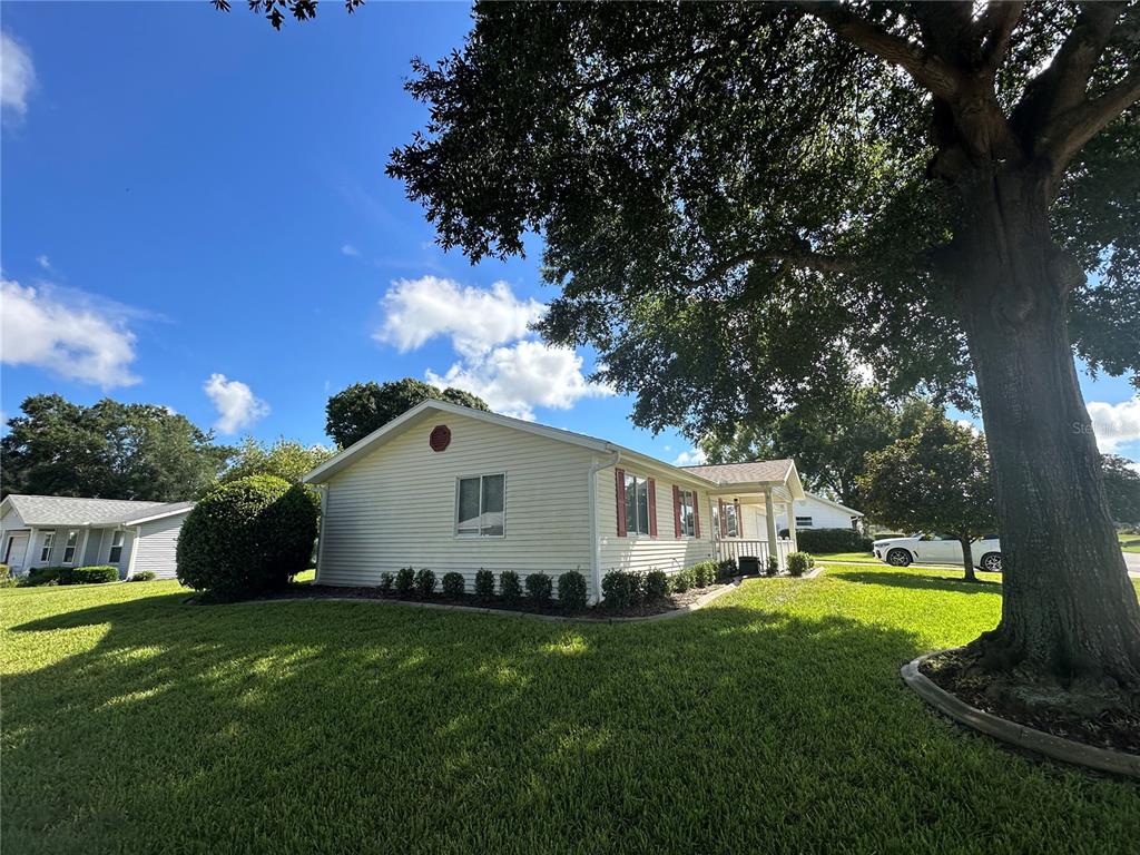 8981 Southwest 116th Street Road Ocala, FL 34481 - Photo 7 of 28 a view of house with backyard