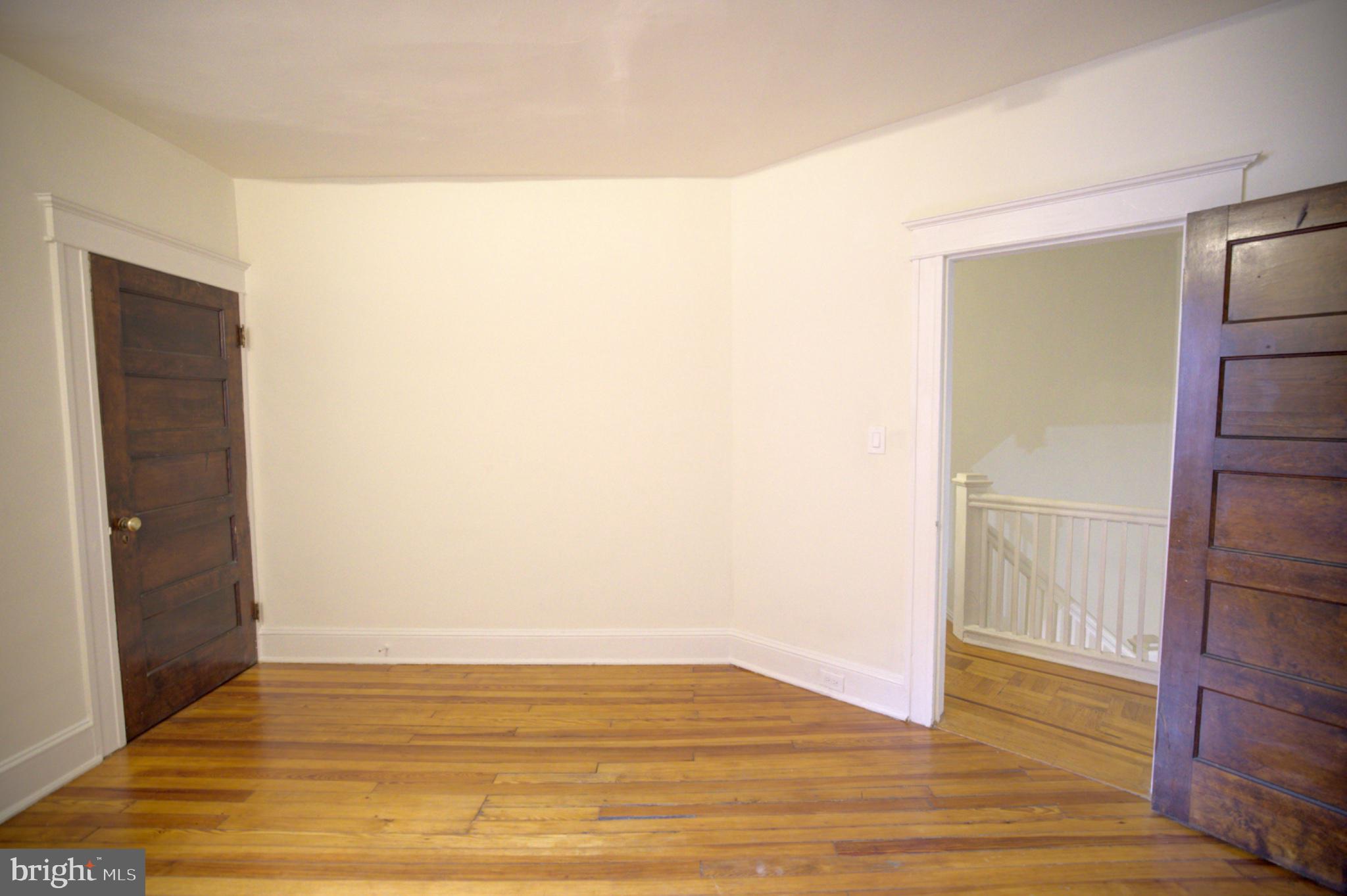 608 East 33rd Street Baltimore, MD 21218 - Photo 12 of 17 Middle bedroom