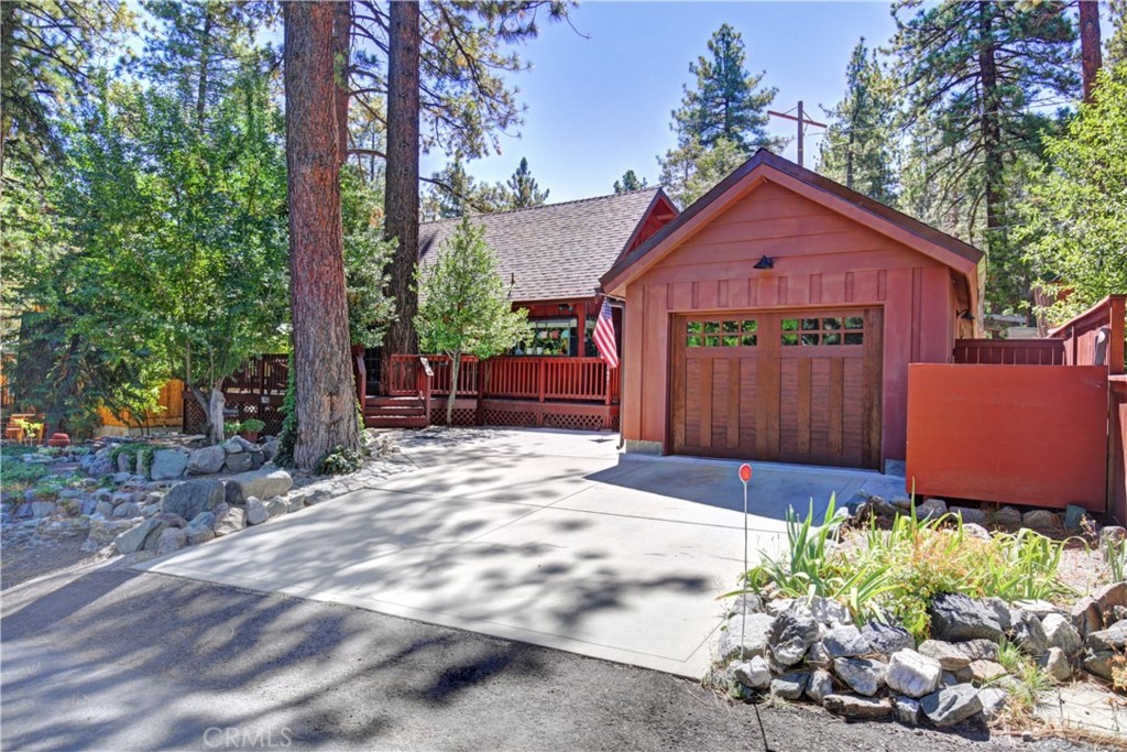 1631 Linnet Road Wrightwood, CA 92397 - Photo 1 of 1 a front view of a house with a yard