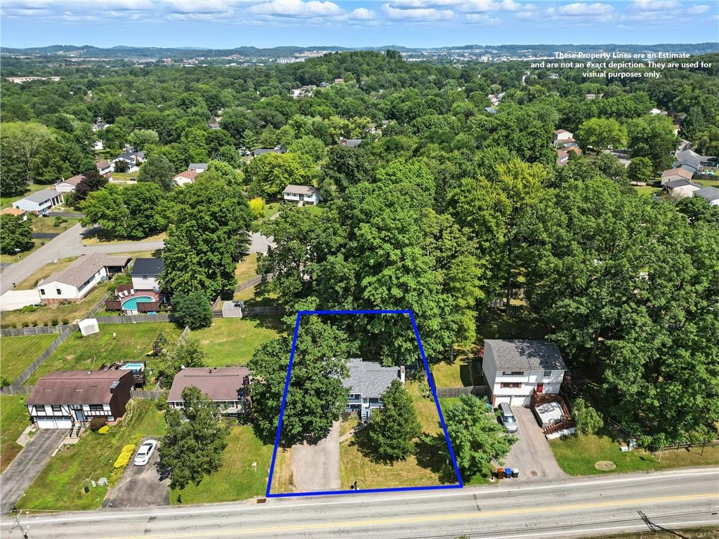 2066 Powell Road Cranberry Township, PA 16066 - Photo 2 of 44 an aerial view of residential houses with outdoor space and trees