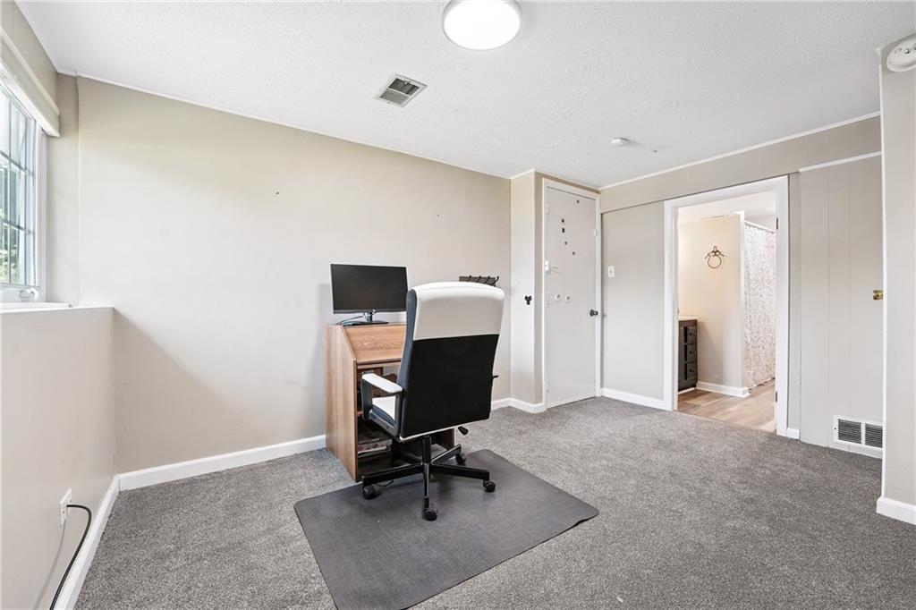 2066 Powell Road Cranberry Township, PA 16066 - Photo 28 of 44 a view of a workspace with furniture and gym equipment