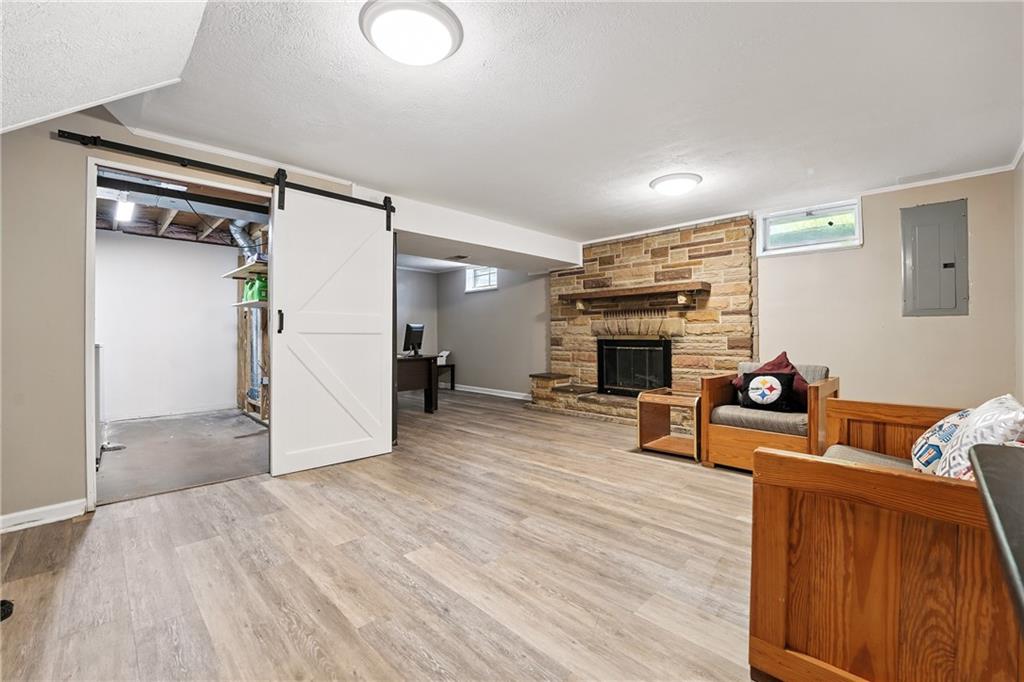 2066 Powell Road Cranberry Township, PA 16066 - Photo 31 of 44 a view of a livingroom with furniture and a fireplace