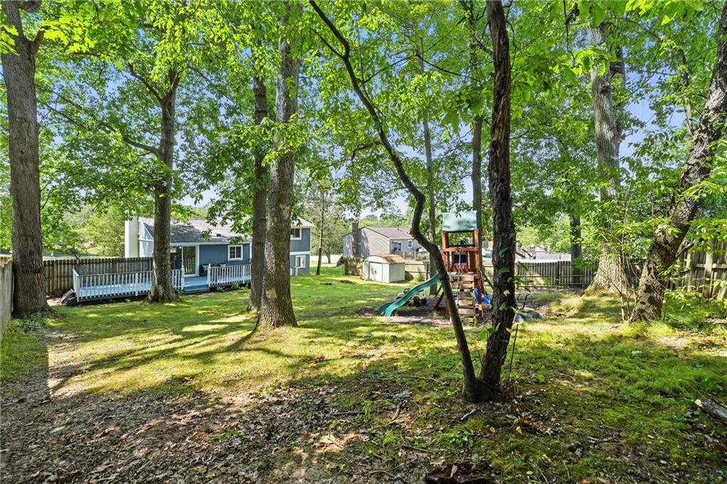 2066 Powell Road Cranberry Township, PA 16066 - Photo 38 of 44 a view of a yard with a tree