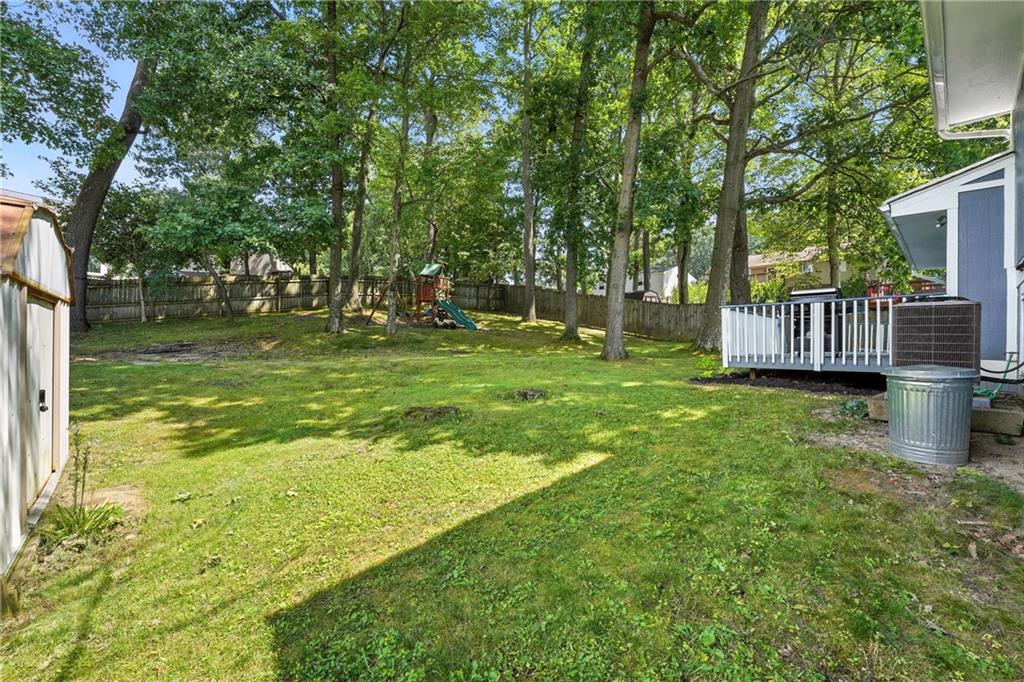 2066 Powell Road Cranberry Township, PA 16066 - Photo 39 of 44 a view of a deck with a big yard