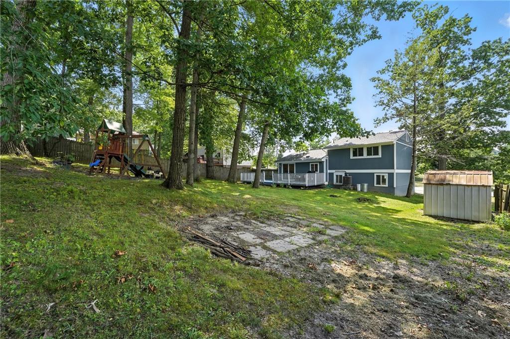 2066 Powell Road Cranberry Township, PA 16066 - Photo 4 of 44 a view of a house with backyard and sitting area